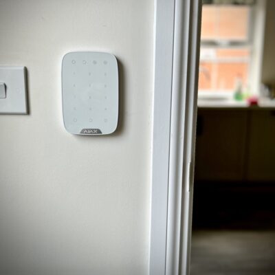 Wireless Alarm System keypad attached to wall