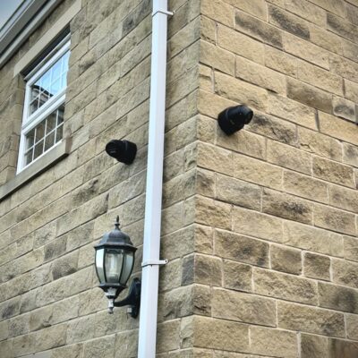 CCTV home security cameras on outer wall with cables hidden and professionally installed by Above Security Sheffield South Yorkshire
