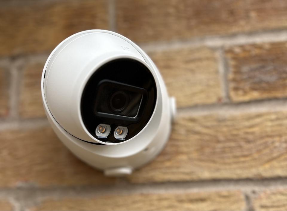white cctv camera