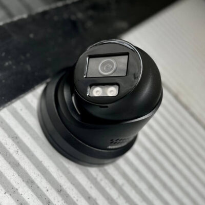 Black hikvision camera installed on a business in sheffield by above security