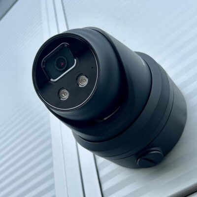Black Hikvision Camera with built in siren to provide outdoor alarm on a commercial property in sheffield